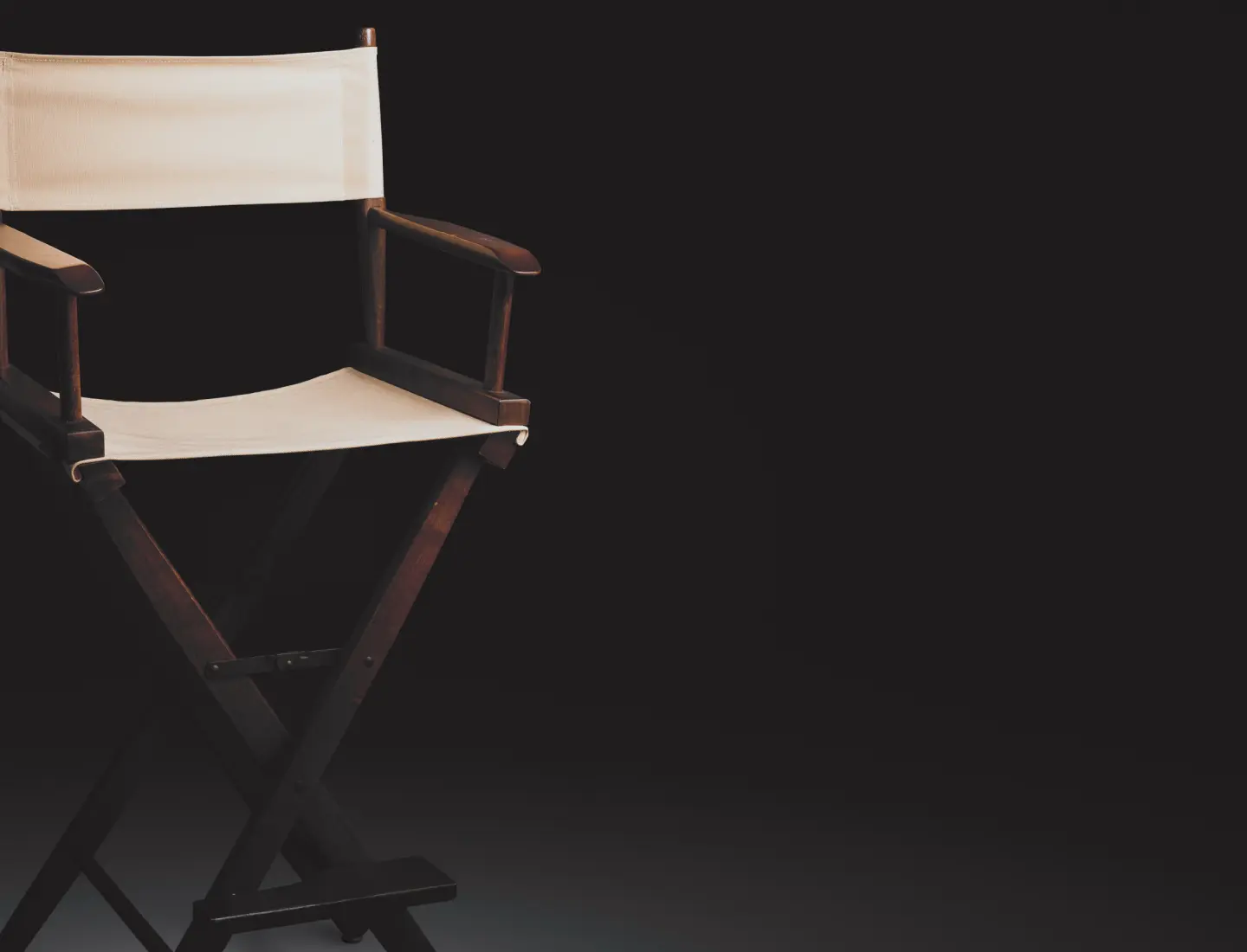 Director chair with clean dark background