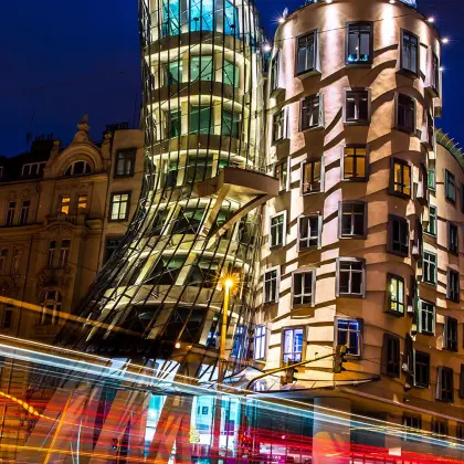 Jason Momoa looking very slim holding guitar